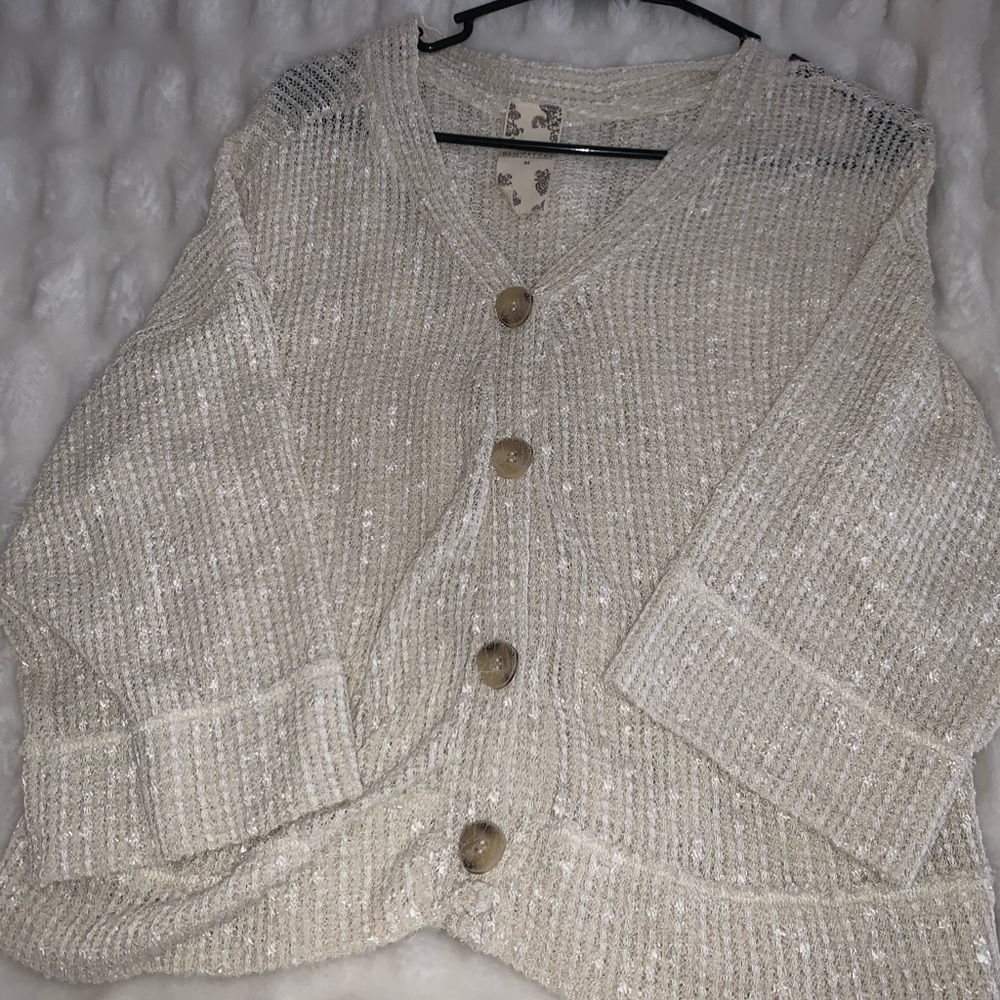 tan sweater